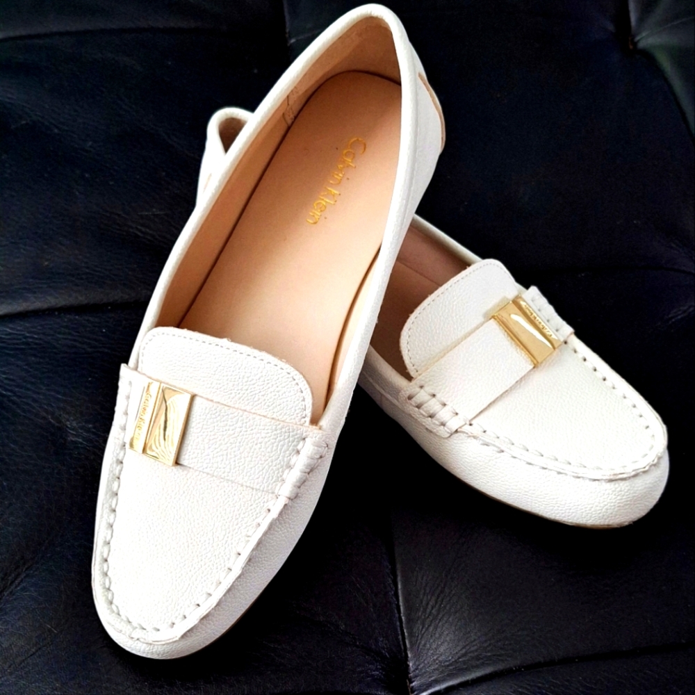 Calvin Klein Cream Leather Loafers with Gold Hardware. Used Size 7